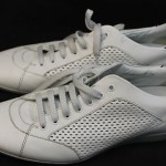[ Two Pairs of Size 10 Hugo Boss Sneakers 1 Brown Suede 1 White Vinyl ]