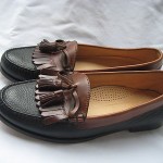 COLE HAAN BLACK AND BROWN LEATHER KILTI TASSEL LOAFERS SIZE 9.5 B
