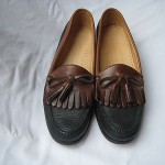 COLE HAAN BLACK AND BROWN LEATHER KILTI TASSEL LOAFERS SIZE 9.5 B