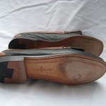 COLE HAAN BLACK AND BROWN LEATHER KILTI TASSEL LOAFERS SIZE 9.5 B