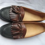 COLE HAAN BLACK AND BROWN LEATHER KILTI TASSEL LOAFERS SIZE 9.5 B