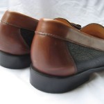 COLE HAAN BLACK AND BROWN LEATHER KILTI TASSEL LOAFERS SIZE 9.5 B