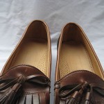 COLE HAAN BLACK AND BROWN LEATHER KILTI TASSEL LOAFERS SIZE 9.5 B