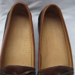 COLE HAAN BLACK AND BROWN LEATHER KILTI TASSEL LOAFERS SIZE 9.5 B