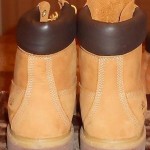 TAN WITH BROWN TRIM TIMBERLAND BOOTS SIZE 10.5–USED