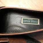 MENS COLE HAAN TWO TONE BLACK AND BROWN LEATHER PENNY LOAFERS SHOES 9.5 D