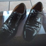 Cole Haan  11   E.      Black leather brogue wingtip oxford shoe