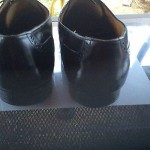 Cole Haan  11   E.      Black leather brogue wingtip oxford shoe