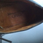 Cole Haan  11   E.      Black leather brogue wingtip oxford shoe