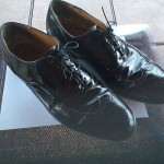 Cole Haan  11   E.      Black leather brogue wingtip oxford shoe