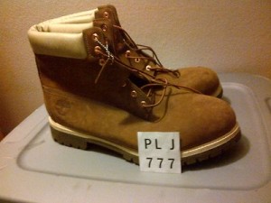 New pair of brown boots, size 18 from Timberland.