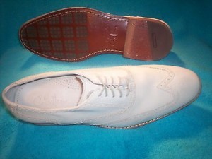 COLE  HAAN  BONE  COLORED  WINGTIPS